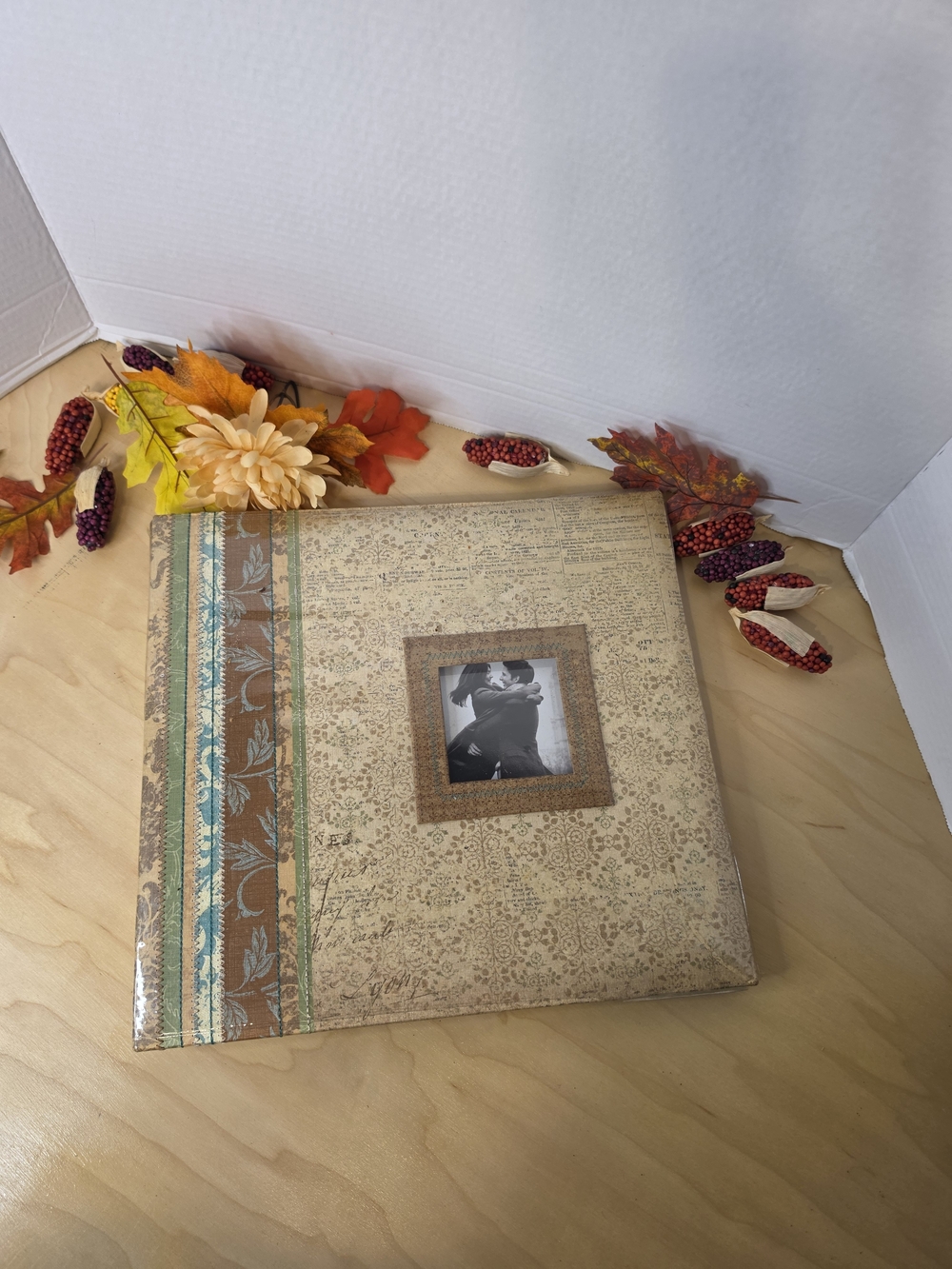 Decorative Vintage-Style Beige Photo Album with Turquoise Accent